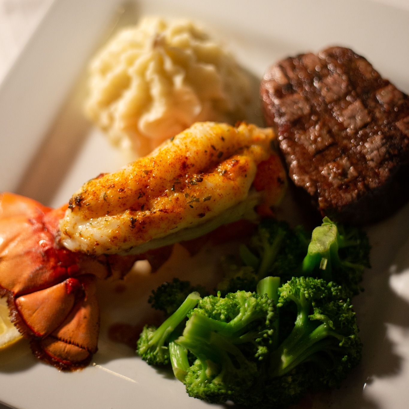 Surf & Turf A 6oz Center Cut Filet & Cold Water Lobster make the ultimate meal. Served with potato and vegetables.